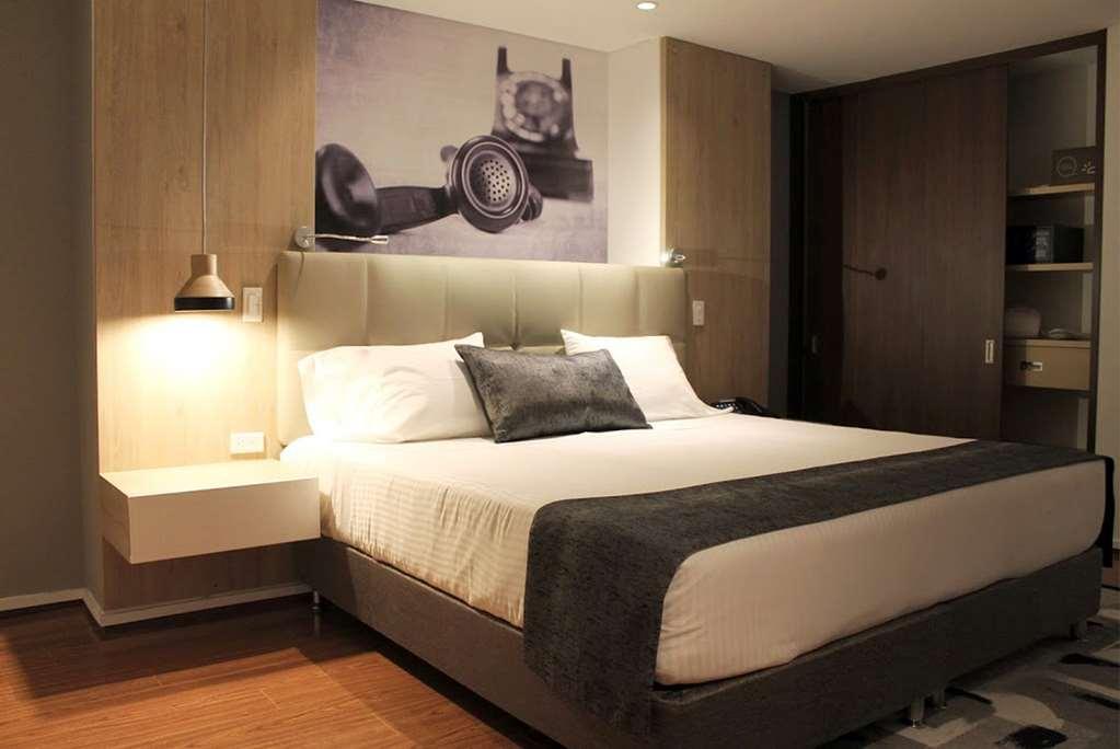 Quo Quality Hotel 马尼萨莱斯 客房 照片 A bedroom at the hotel